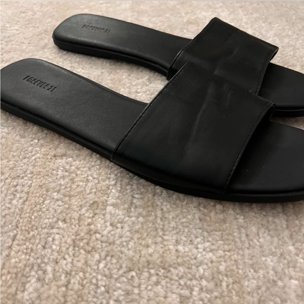 Black leather sandals